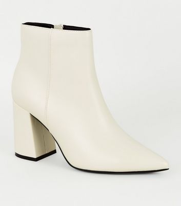 white leather pointed toe boots