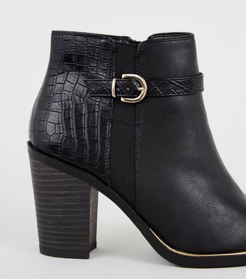 heeled croc boots