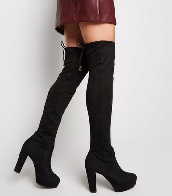 black platform over the knee boots