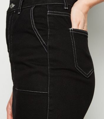 black women's jeans with white stitching