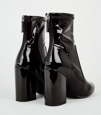 patent black heeled boots