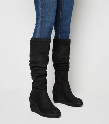 black leather wedge boots knee high