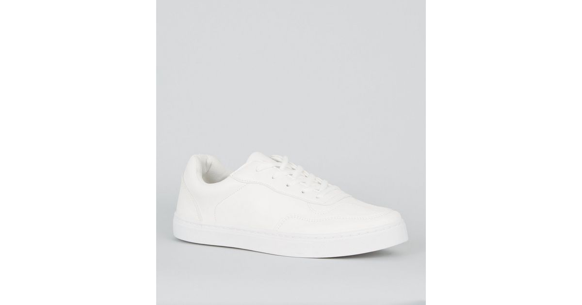 white leather trainer paint