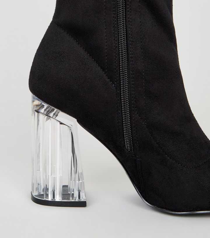 clear black boots