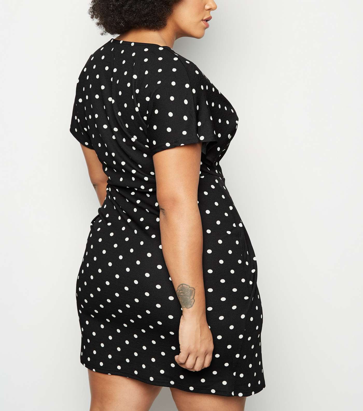Mela Curves Black Polka Dot Wrap Dress Image 3