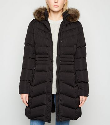 black longline belted puffer jacket