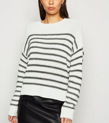 grey and white striped jumper