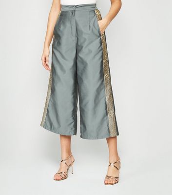 silver cropped trousers