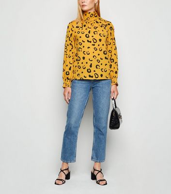 yellow animal print blouse