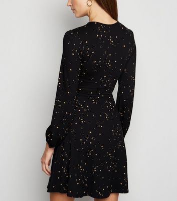 black long sleeve dress with stars