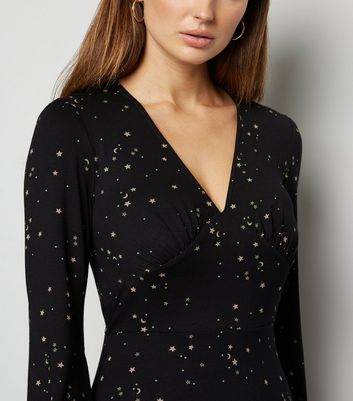 black long sleeve dress with stars