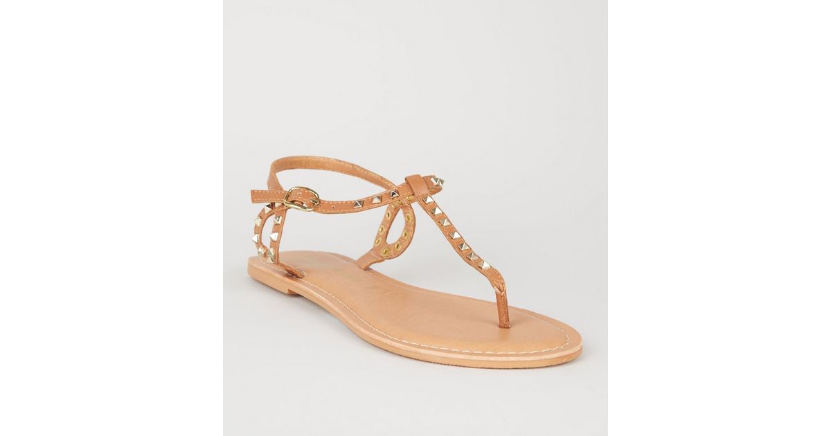 tan sandals with studs