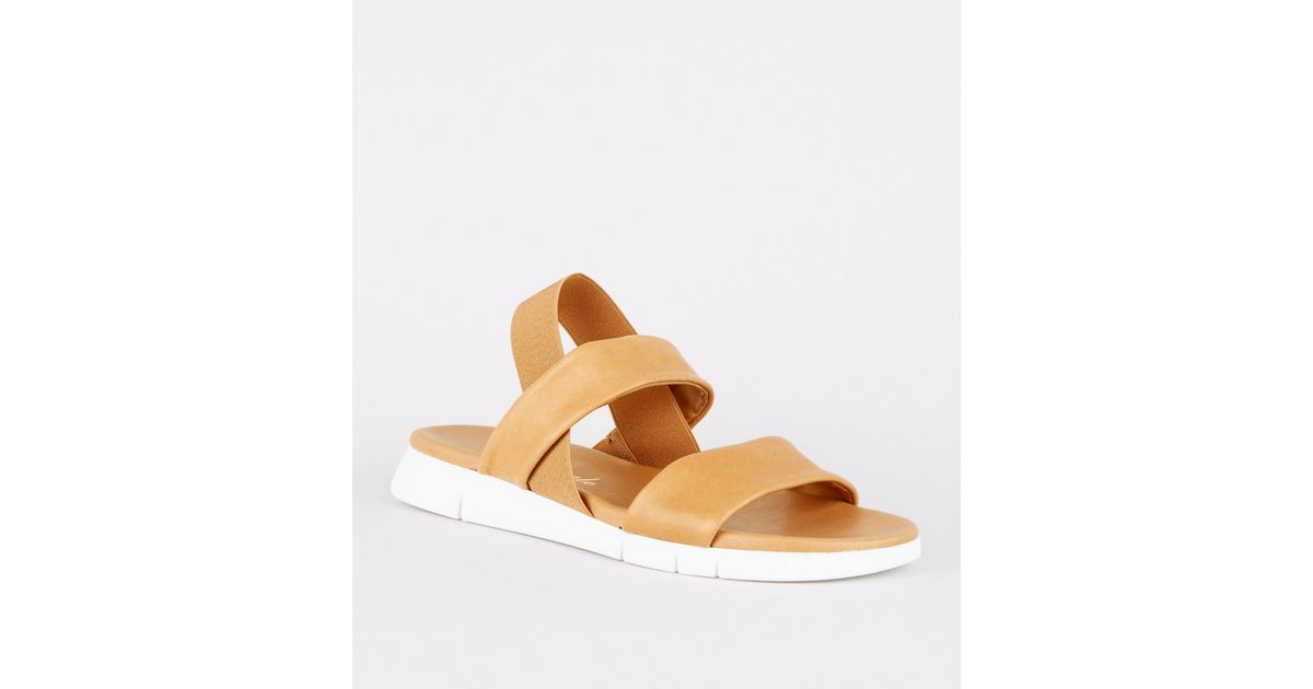 two strap tan sandals