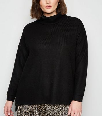 black knitted polo neck jumper