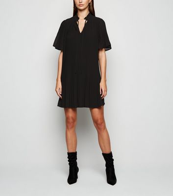 black dress with tie neck