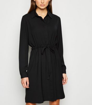 black long sleeve dress with boots