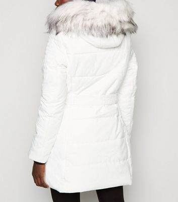 white fur hooded parka