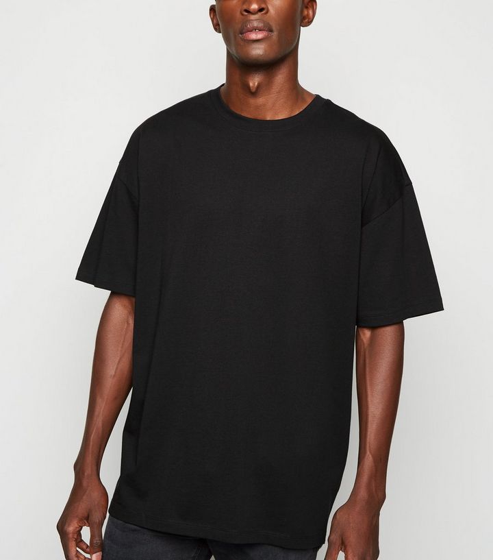 Oversize T Shirt Aus Baumwolle In Schwarz Mit Rundhalsausschnitt New Look