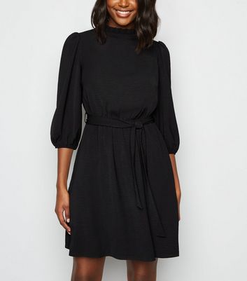 black with frilled neckline