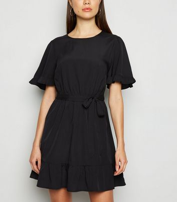 black dress with frill sleeves