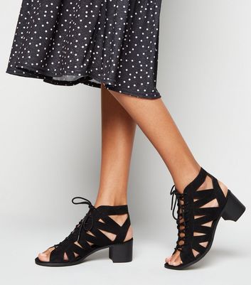 Lace up store low heel sandals