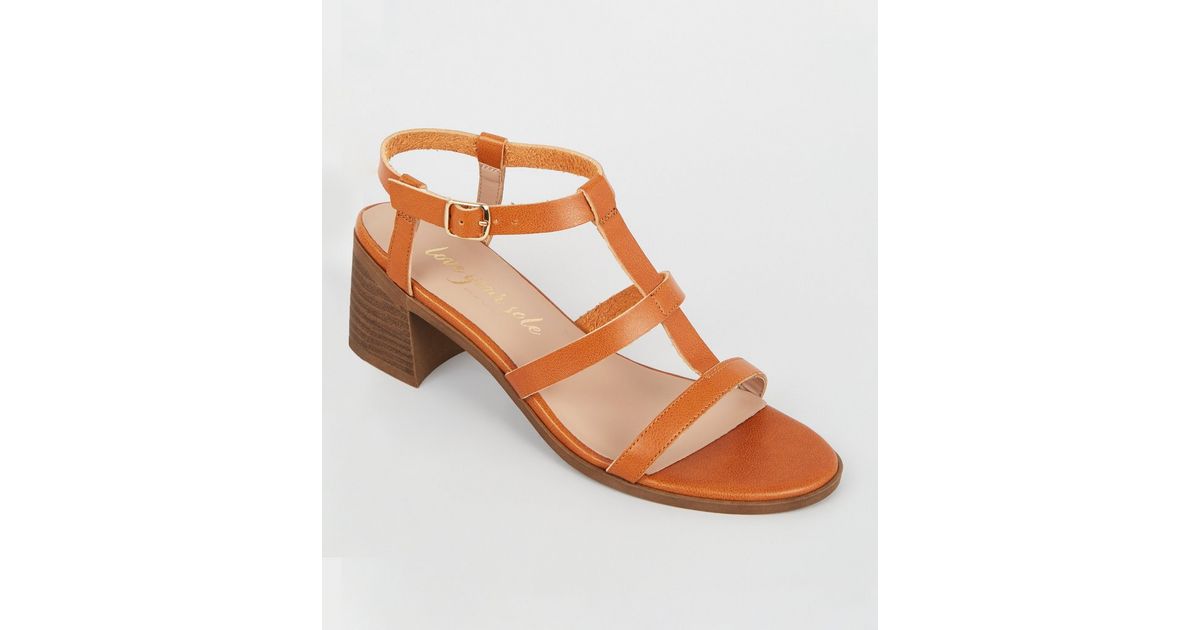 tan block heel gladiator sandals