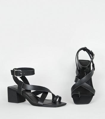 strappy black shoes