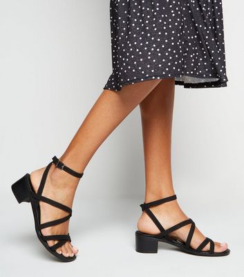 strappy black shoes