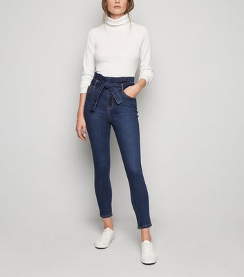 high waisted jeans with tie belt