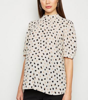 white spot blouse