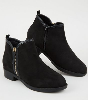 Flat heeled hotsell black boots