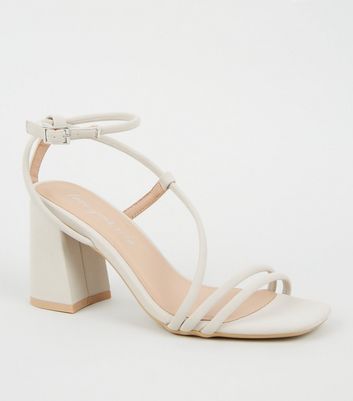 off white flared block heel sandals