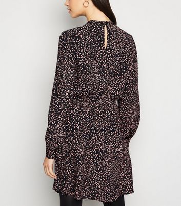 black and leopard dress