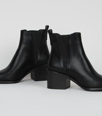 black leather heeled chelsea boots womens