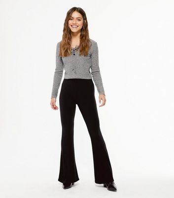 Petite Black Ribbed Flared Leggings 