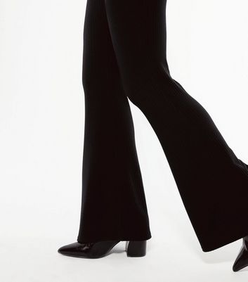 Petite Black Ribbed Flared Leggings 