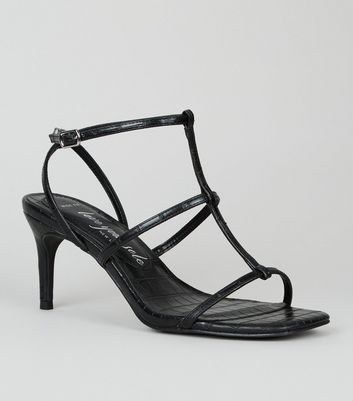 strappy croc sandals