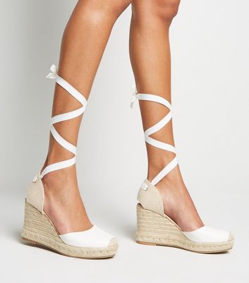 white leather wedges