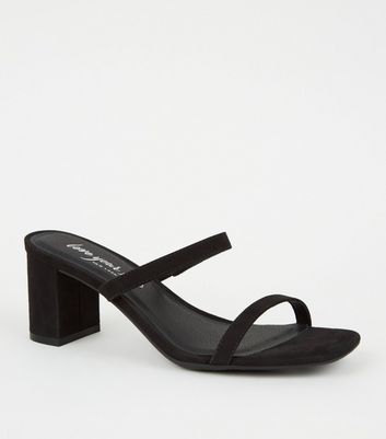 heeled mules black