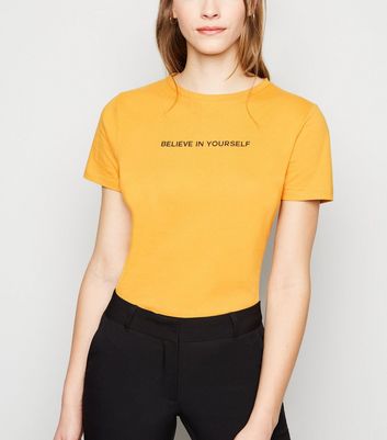 mustard yellow t shirt outfit