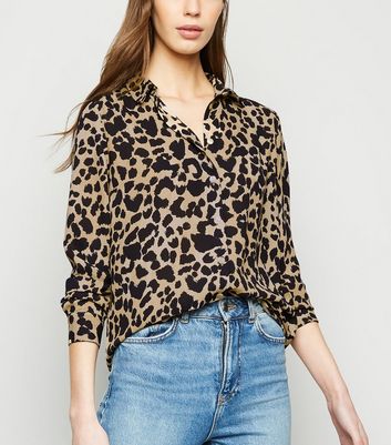 leopard print shirt and jeans