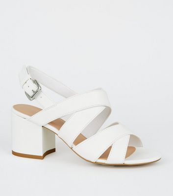 white cross strap heels