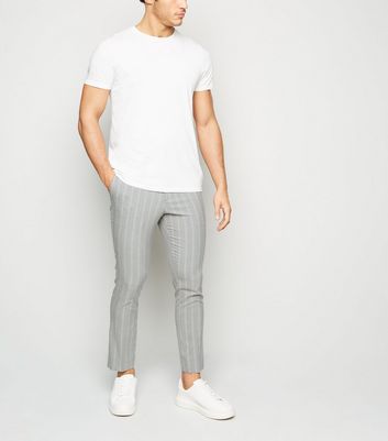 grey trousers with stripe