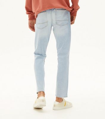 Bleach wash hot sale jeans mens