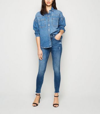 Uneven frayed hot sale hem jeans