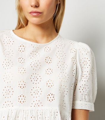 white broderie peplum top