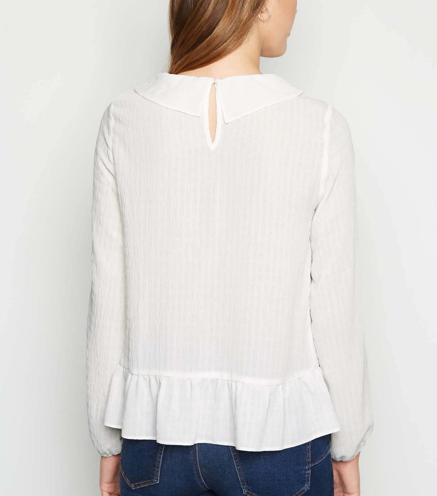 Off White Textured Collared Peplum Blouse Image 3
