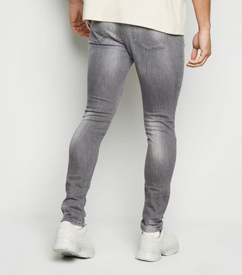 Spray on cheap grey jeans