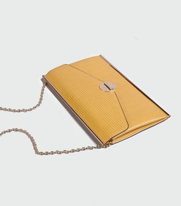 new look yellow clutch bag