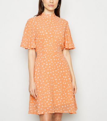 orange spot dress